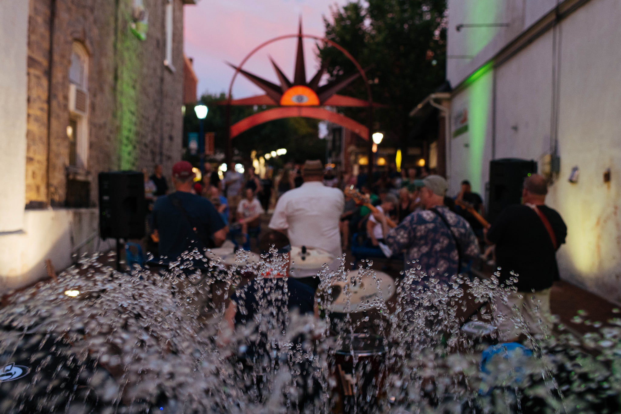 Musicians playing at the Children's Plaza fountain during a Phoenixville First Friday.